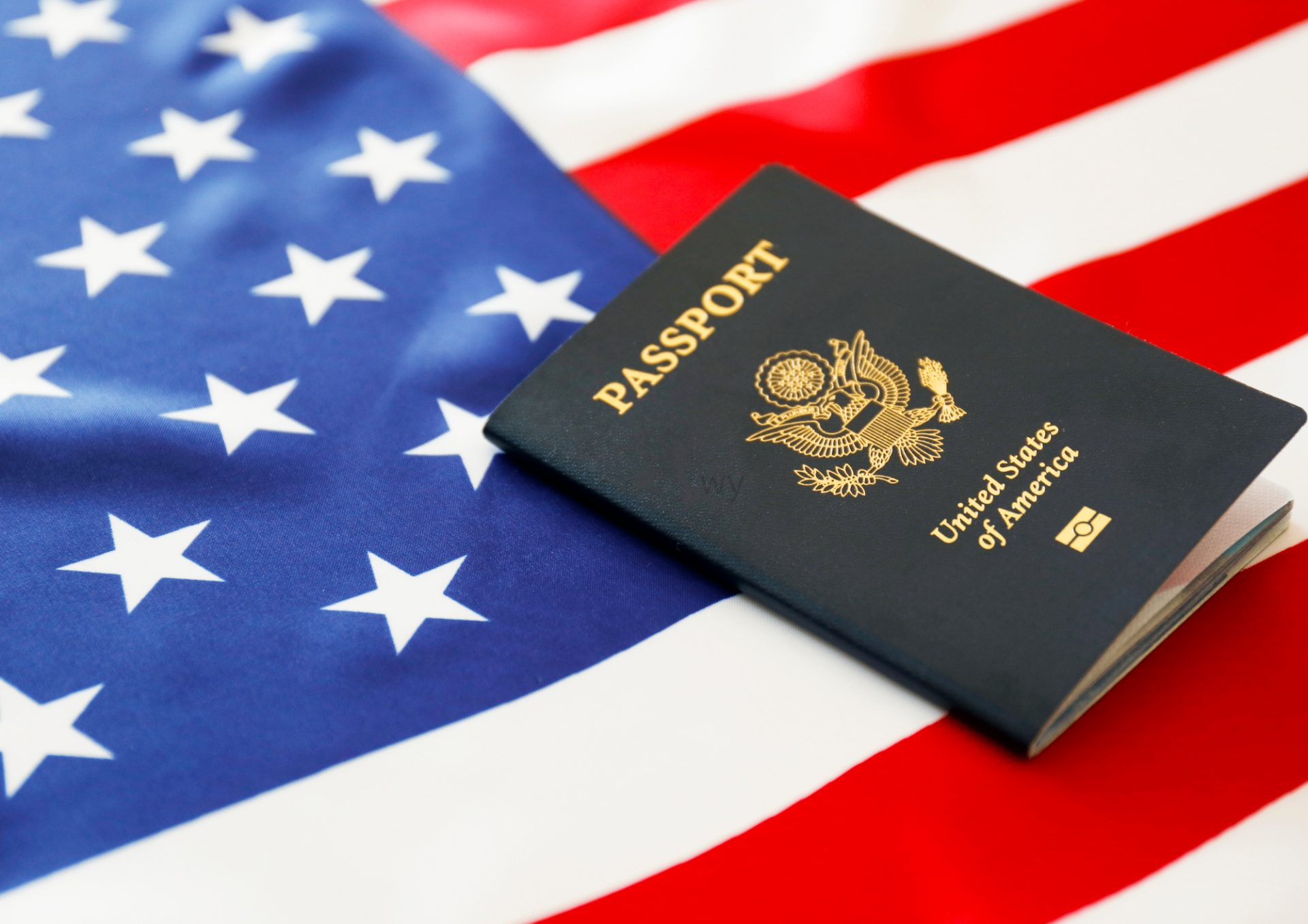 U.S. passport on an American flag — financial advisor for U.S. citizens in Stuttgart