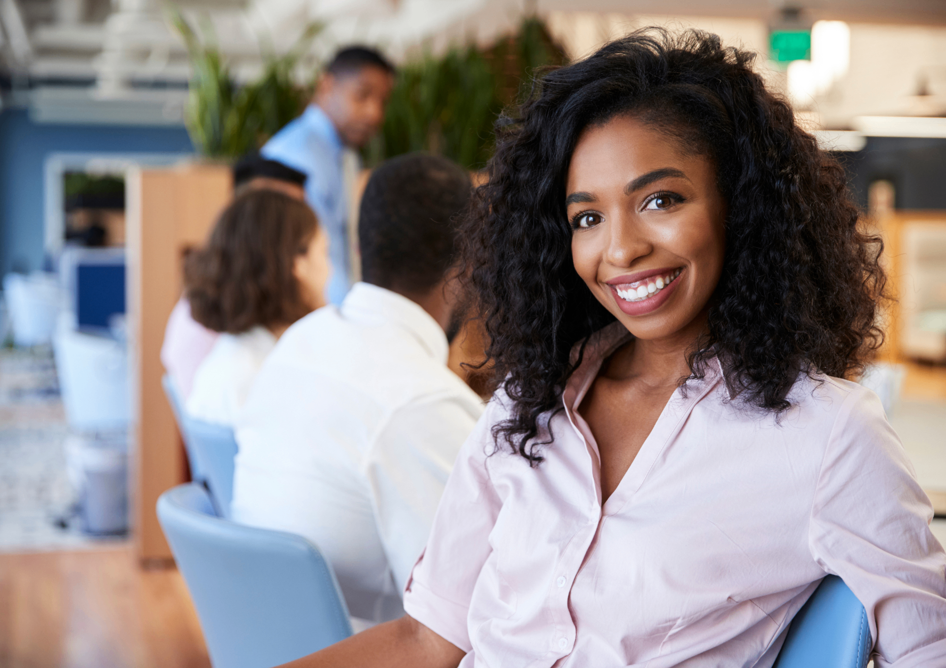 Female financial advisor welcoming a U.S. client in a Stuttgart office